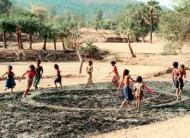 A Walking and Running Circle, Warli Tribal Land, Maharashtra, India, 2003, by Richard Long. Photogra