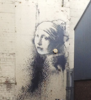 The Girl with the Pierced Eardrum by Banksy