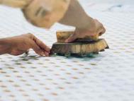 Hand block printer at work, at the Anokhi workshop. Photograph: Sue Carpenter