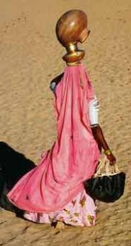 Woman visiting a water-hole. From India by Olivier F