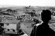 Slum dwellings surrounding Bombay International Airport. Photograph: Paolo Pellegrin/Magnum Photos