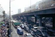 Before: the choked traffic on the six-lane highway with the Cheonggyecheon river canalised and hidde