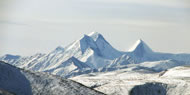 Three peaks of the Sacred Mountain Uch-Sumer 4506meters above sea level Photograph: © FSDA/Chagat Almashev, 2009