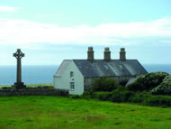 A holiday farmhouse on Bardsey stands next to the cemetery belonging to the old monastery, where some 20,000 saints are said to be buried. Photograph: Courtesy Gail Simmons