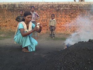 Geeta Tudu reporting on coal mining pollution in Jharkhand